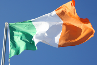 Image of Ireland flag flying in the sky