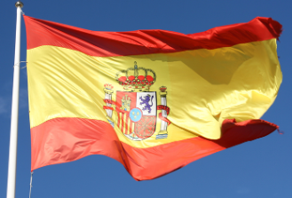Image of Spain flag flying in the sky
