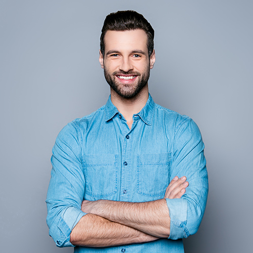 Smiling healthcare professional with mask and cleaning cart