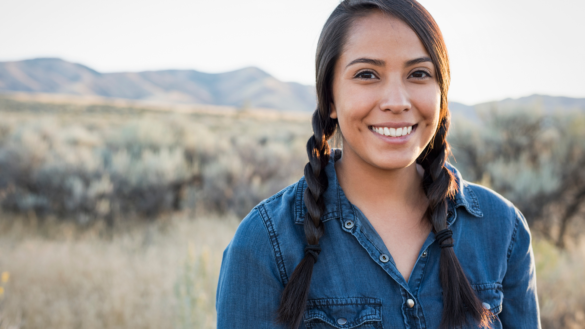 Forward facing woman smiling